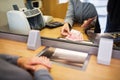 Clerk counting cash money at bank office Royalty Free Stock Photo