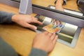 Clerk giving cash money to customer at bank office Royalty Free Stock Photo