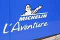 Michelin l`aventure bibendum logo blue sign and text logo on corporate museum