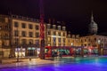 Night view of Jaude square (Place de Jaude) lightened by purple light in Clermont Ferrand, France