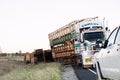 Road train cattle semi trailer accident on highway.