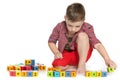 Clever boy with blocks on the floor Royalty Free Stock Photo