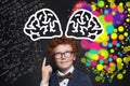 Clever child and brain power. Brainstorming concept Royalty Free Stock Photo