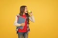 Clever eating. Little kid eat apple yellow background. School break. Fruit snack. Brain food. Cognitive health. Diet and