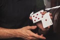 Close-up clever hands of magician with gambling cards Royalty Free Stock Photo