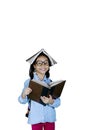 Clever little girl with books on studio Royalty Free Stock Photo