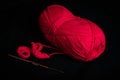 Clew of pink thread with tool for crochet Royalty Free Stock Photo