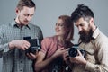 Click with smile. Group of photographers with retro cameras. Paparazzi or photojournalists with vintage old cameras Royalty Free Stock Photo