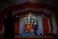 Clicking a picture of a beautiful idol of Lord Ganesha