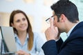 client asking eyeglasses adjustment Royalty Free Stock Photo