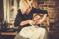 Client during beard shaving Royalty Free Stock Photo