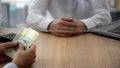 Client making russian rubles deposit in bank, savings and personal spending