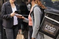 Client paying for delivery with smartphone closeup, mobile wallet