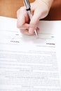 Client signs a contract by silver pen Royalty Free Stock Photo