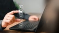Client use a computer laptop with a virtual screen for apps phones, email, addresses, chat, and map icons. Royalty Free Stock Photo