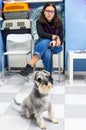 Client waiting with her pet in a veterinary clinic