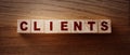 Clients Word In Wooden Cubes. B2C business concept, client oriented marketing strategy concept