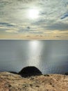 A cliff above the sea. Sunset on the empty rocky shore. Cyprus, Mediterranean Sea coast, Cape Greco view point. Royalty Free Stock Photo