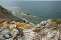 Cliff with beautiful sea view and rocky beach Royalty Free Stock Photo