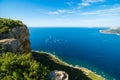 Cliff and boats in the bay of Cote d`Azur