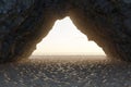 cliff cave with a view of the sea and sky at sunset Royalty Free Stock Photo