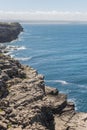 Cliff in the coastline with blue sea Royalty Free Stock Photo