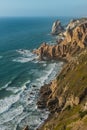 Cliff in the coastline with blue sea Royalty Free Stock Photo