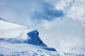 Cliff covered with snow high in the French Alps