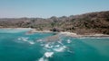 Cliff with crystal blue water in Costa Rica, Santa Teresa. Central America landscape from top view.