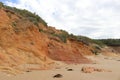 A cliff face at low tide