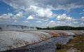 Cliff Geyser next to Iron Spring Creek in Black Sand Geyser Basin in Yellowstone National Park in Wyoming USA Royalty Free Stock Photo