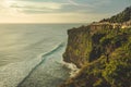 Cliff, ocean shore, tourist path. Panorama. Bali.