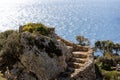 Cliff with old ruined stairs near the sea in Malta