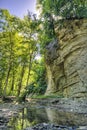 Cliff over a creek Royalty Free Stock Photo