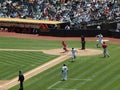 Cliff Pennington sprints home as catcher waits