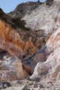 cliff of red and orange sulfur rocks on the wild Greek island of milos Royalty Free Stock Photo