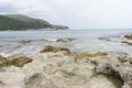 Cliff, Rocks by the Mediterranean sea on the island of Ibiza in Royalty Free Stock Photo