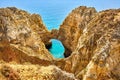 Cliff rocks and sea bay with turquoise water in Lagos, Algarve region, Portugal Royalty Free Stock Photo