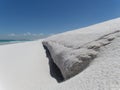 Cliff shaped sandbar at Big Beach Praia Grande Royalty Free Stock Photo