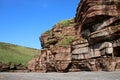 Cliff, shingle beach, Fleswick Bay, St Bees Head Royalty Free Stock Photo