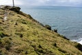 Cliff side with blue sea behind