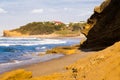 Cliff stone beach village sea waves, beautiful nature landscape.