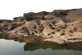 Cliff stone located part of the mountain rock shape look like the dogÃ¢â¬â¢s head reflection on river water