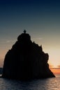 Cliff Strombolicchio, sunset, Italy Royalty Free Stock Photo