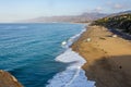 Cliff top view of california beach shoreline waves breaking into distance