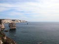 Cliffed Coast of Bonifacio Town and Mediterranean Sea with big r Royalty Free Stock Photo