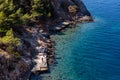 Cliffs and Avlaki beach in Hydra Island Royalty Free Stock Photo