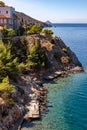 Cliffs and Avlaki beach in Hydra Island Royalty Free Stock Photo