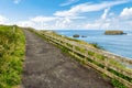 Cliffs of Carrick-a-rede rope bridge in Ballintoy, Co. Antrim. Landscape of Northern Ireland. Royalty Free Stock Photo