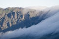 Cliffs of Chapin and sea of clouds descending the slope.